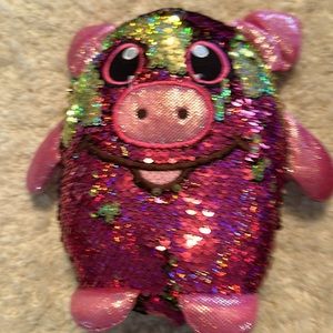 Shimmeez Pig. Pink and gold. Rub up you get gold.Down you get pink.